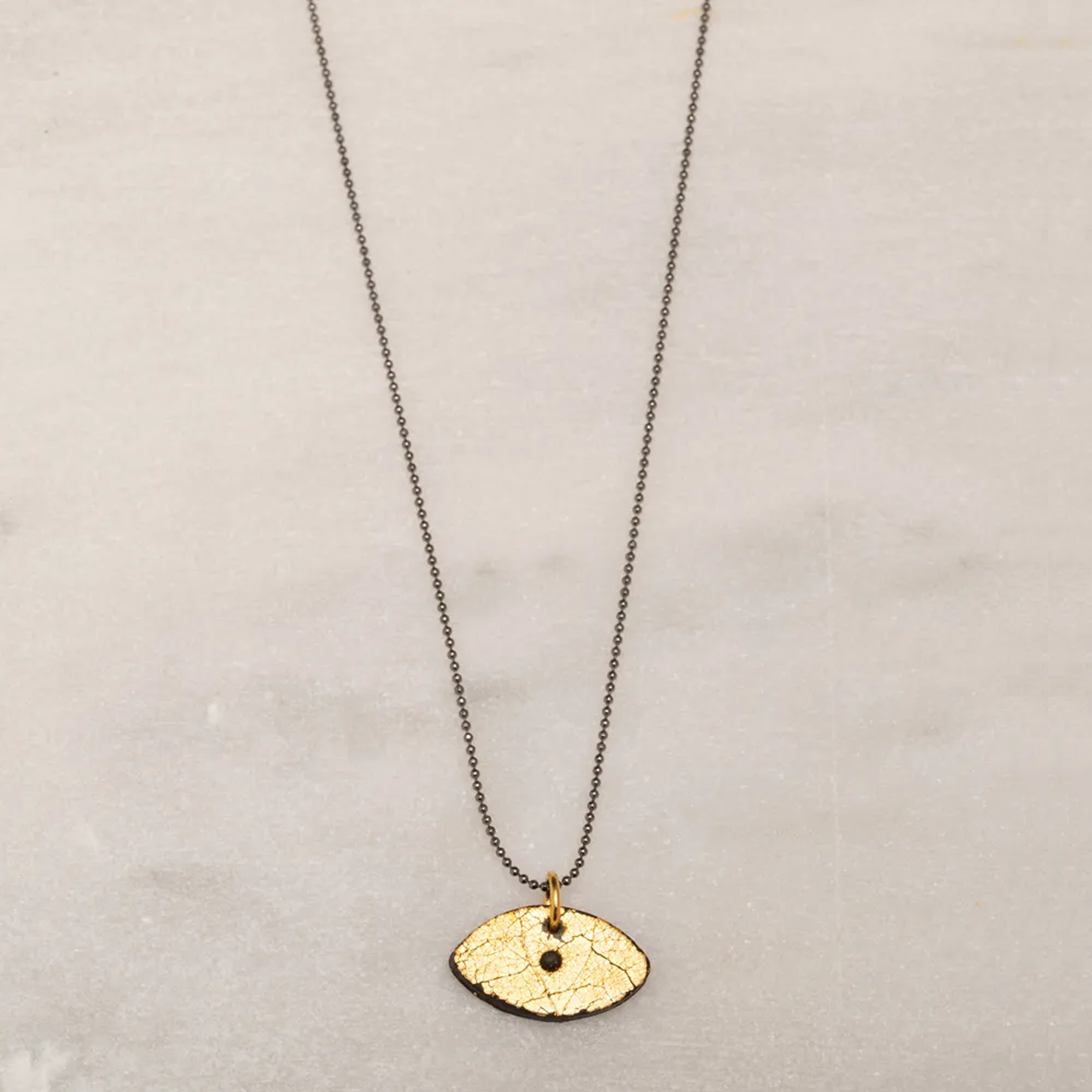BLACK MOON EYE NECKLACE
